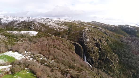 Waterfall in Winter in the Snow