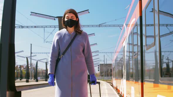 Woman in Protective Face Mask at Railway Station