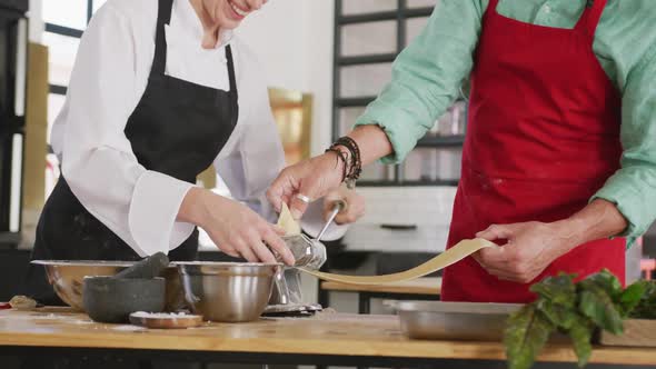 Chefs making pasta together