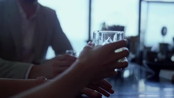 Couple Hands Clinking Glasses Restaurant Closeup