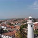Lighthouse against Small Village - VideoHive Item for Sale