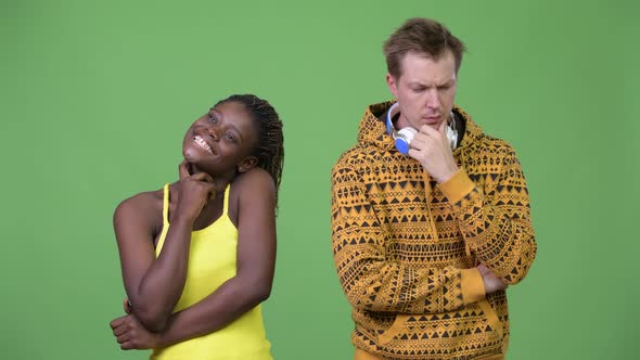 Young Multi-ethnic Couple Thinking Together