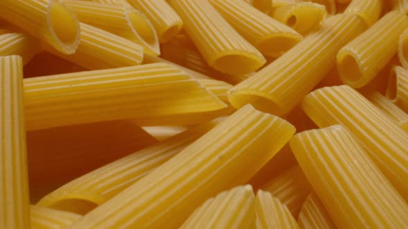 National Cuisine Concept. Closeup of Uncooked Italian Pasta