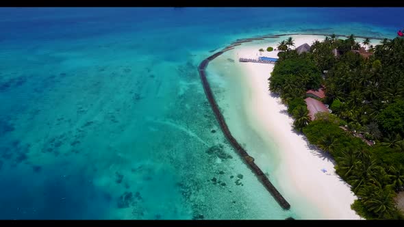 Aerial top down nature of relaxing resort beach vacation by blue water and white sand background of 