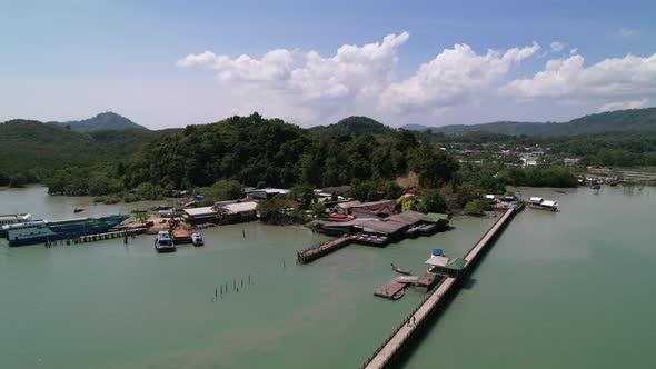 Laem Hin Pier in a small fishing village around thailand surrounded by andaman sea, aerial