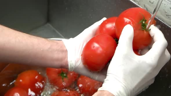 Hands Washing Tomatoes Close Up