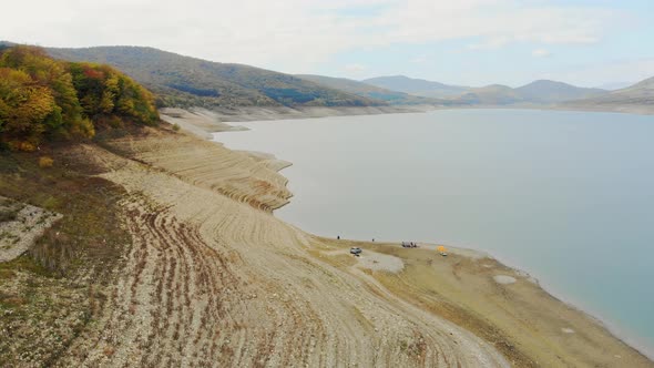 Fly Over Group Of Campers By Sioni Dam Fishing.Log