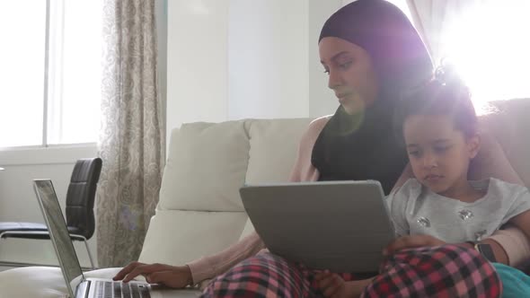 Mother and daughter at home