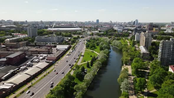 Drone Flies Over City River