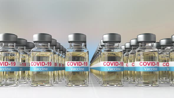 Covid-19 Vaccine bottles line up in the row