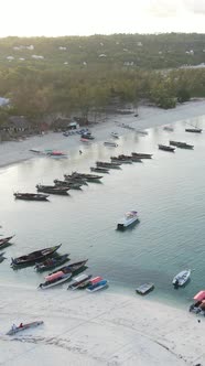 Vertical Video Boats in the Ocean Near the Coast of Zanzibar Tanzania