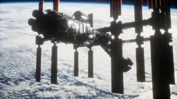 International Space Station in Outer Space Over the Planet Earth alt