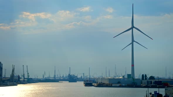 Wind Turbines in Antwerp Port on Sunset