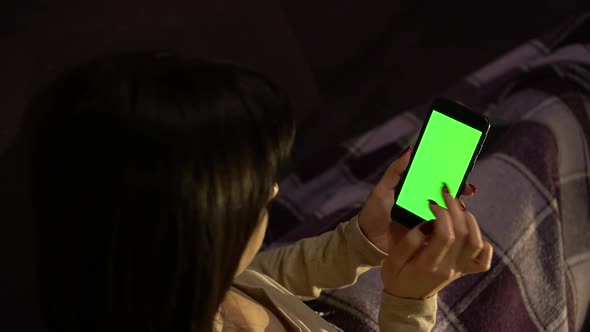 Woman Holding Chroma Key Green Screen Smartphone