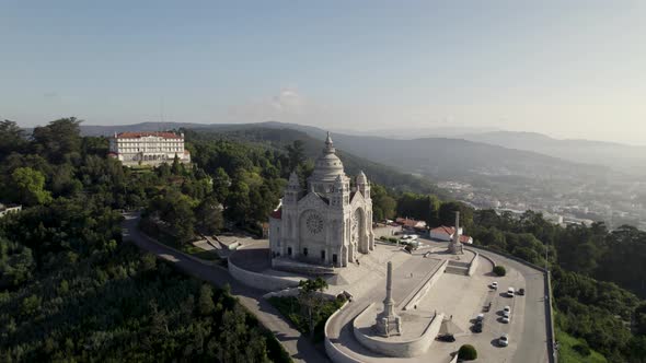 Grandiose Catholic church on mountaintop, Viana do Castelo, Portugal; drone