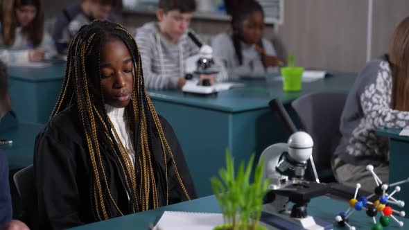 Distressed African American Schoolgirl in Lesson