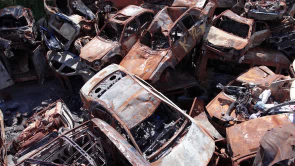 War in Ukraine a Dump of Shot and Burned Cars in Irpin Bucha District