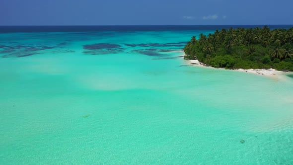 Aerial nature of luxury tourist beach trip by aqua blue sea and bright sand background of a picnic b