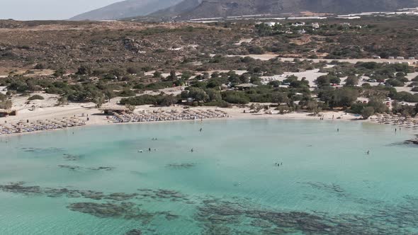 Crystal clear sea water near sandy coastline of Elafonissi beach in island of Crete