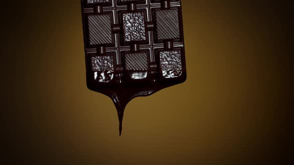 Chocolate Bar with Melted Chocolate Syrup Dripping Flowing Over Dark Brown Background Confectionery