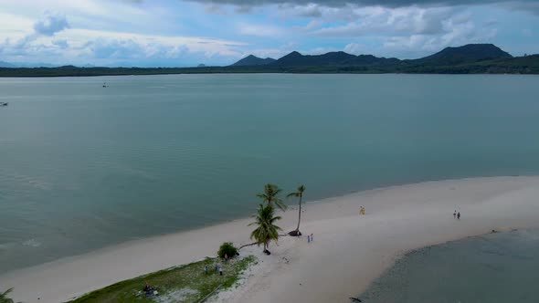 Couple Men and Women Walking on the Beach at the Island Koh Yao Yai Thailand Beach with White Sand