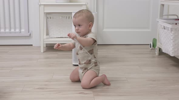 Toddler Playing with Electric Wire on Floor at Living Room 1 Year Old Infant Holding the Electric