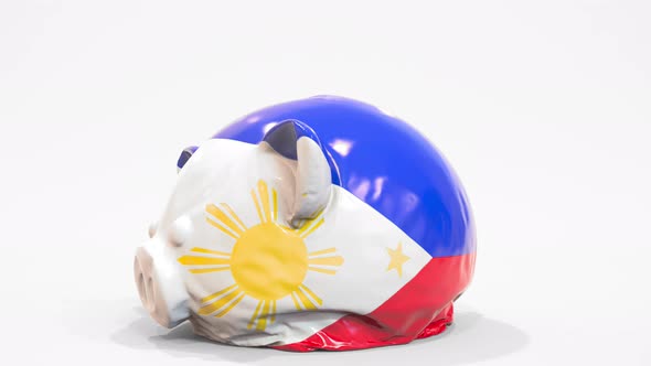 Deflating Piggy Bank with Printed Flag of the Philippines