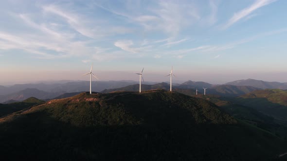 Wind Turbines in mountain during sunset