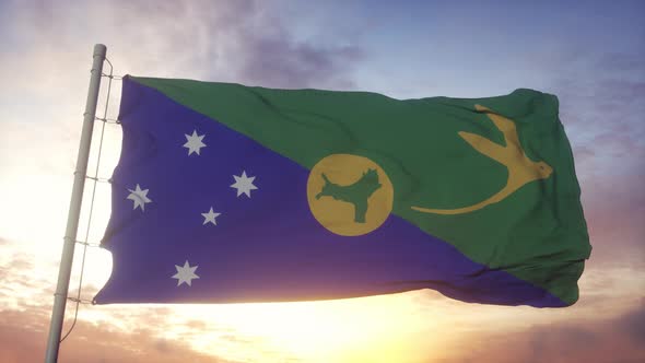 Flag of Christmas Island Waving in the Wind Sky and Sun Background