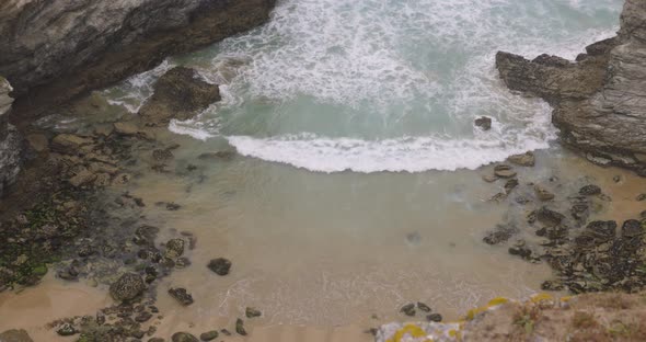 Cornwall seaside view with waves and cliffs