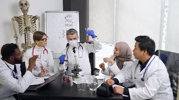 Doctors-Interns with His High-Skilled Head Doctor During the Lecture About the Composition