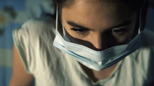 European Girl Cover Her Face With Mask At Night