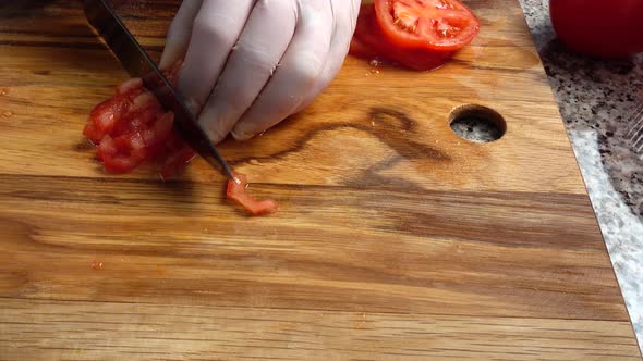 The Cook Cuts Tomatoes 2