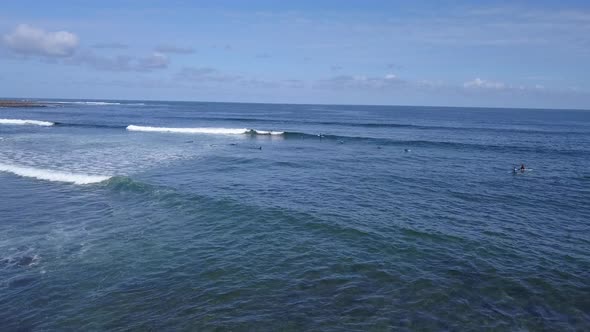 A View From Above of the Surfers in the Ocean