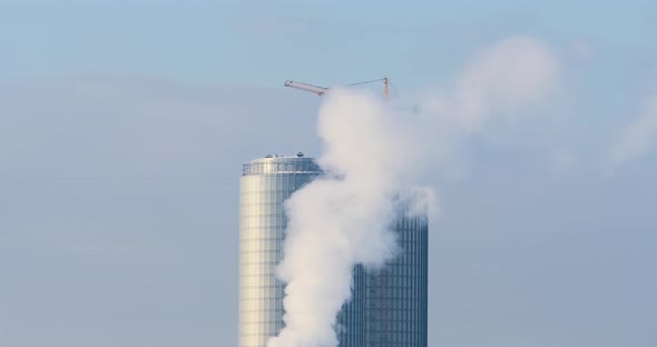 4K - Skyscraper in smoke