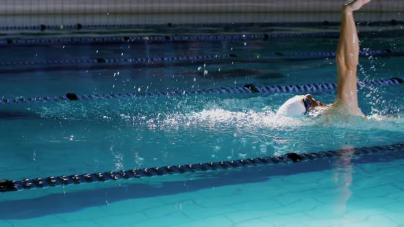 Swimmer training in a swimming pool