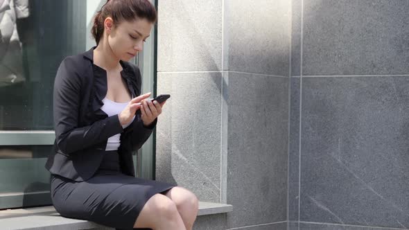 Business Woman Busy Using Smartphone