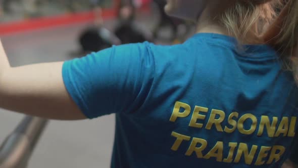 Personal Trainer Cheering Her Trainee in Gym, Teamwork and Cooperation, Support