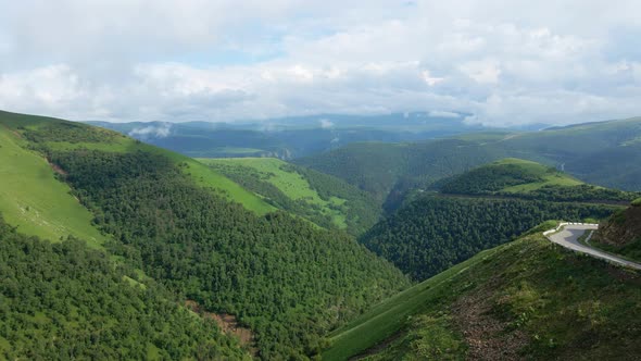 View of the Green Caucasus Mountains in Summer From the Sky