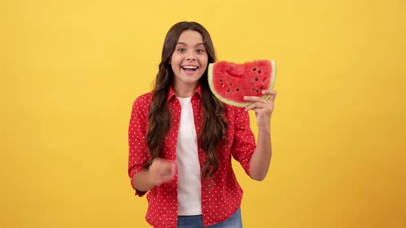 Amazed Child Hold Water Melon Slice on Yellow Background Summer