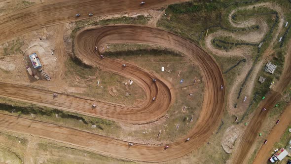 Fly Over Fastmoving Motocross Shifts Along a Winding Track