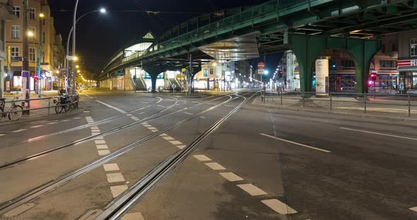 Night traffic timelapse on a busy intersection in central Berlin with streetcars