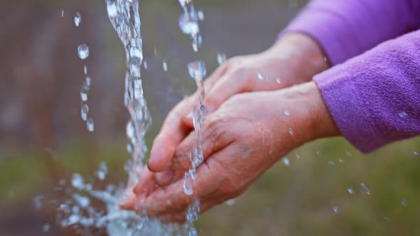 Farmer Hand Waters