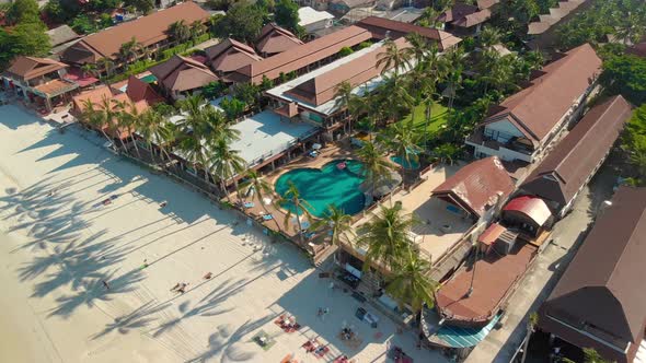 Aerial View of Resort with Pool on the Tropical Beach