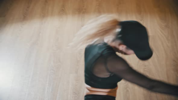 Plastic Blonde Woman Sexy Dancing on the Floor