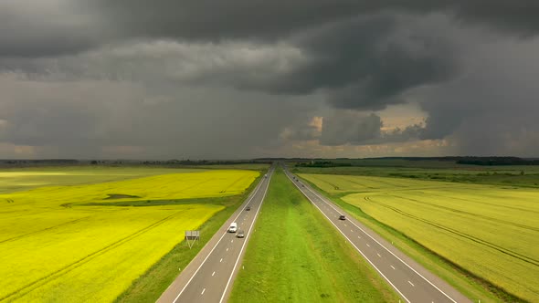 The storm clouds over the highway, view from a drone