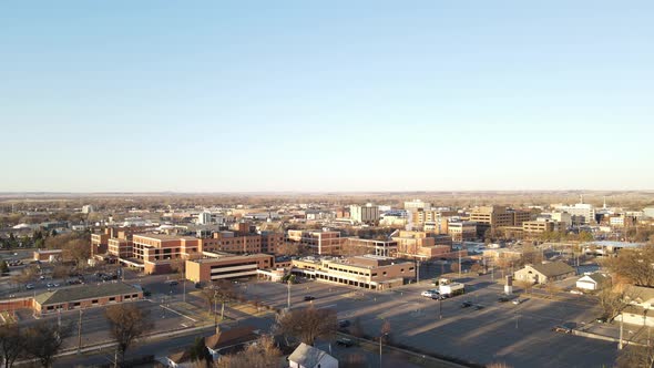 North Dakota community and landscape on a bright sunny day. Business complex and homes.