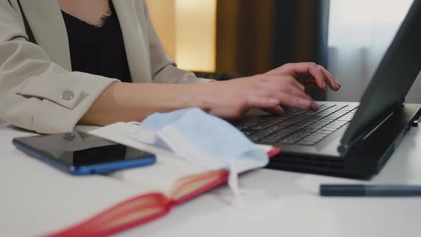 Female hands of business woman professional user worker using typing on laptop