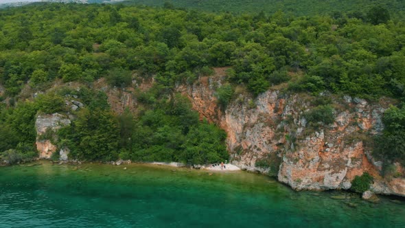 Aerial shot of Macedonia coast. Clif and beautiful water around Ohrid Lake in Southern Europe.