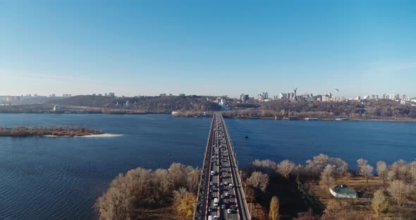 City Traffic on the Big Bridge at the Autumn Aerial View